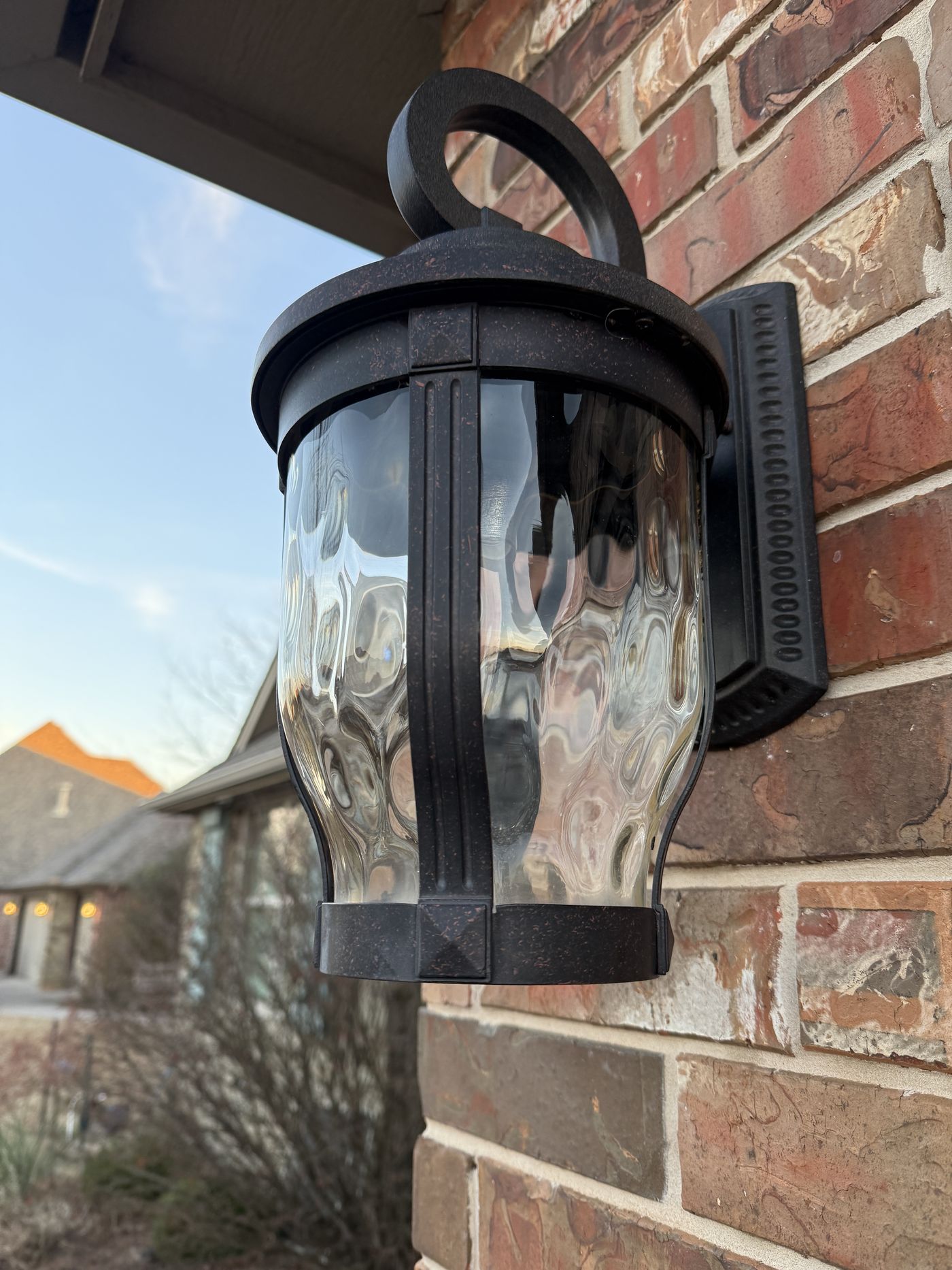 Same light fixture after cleaning, clear glass